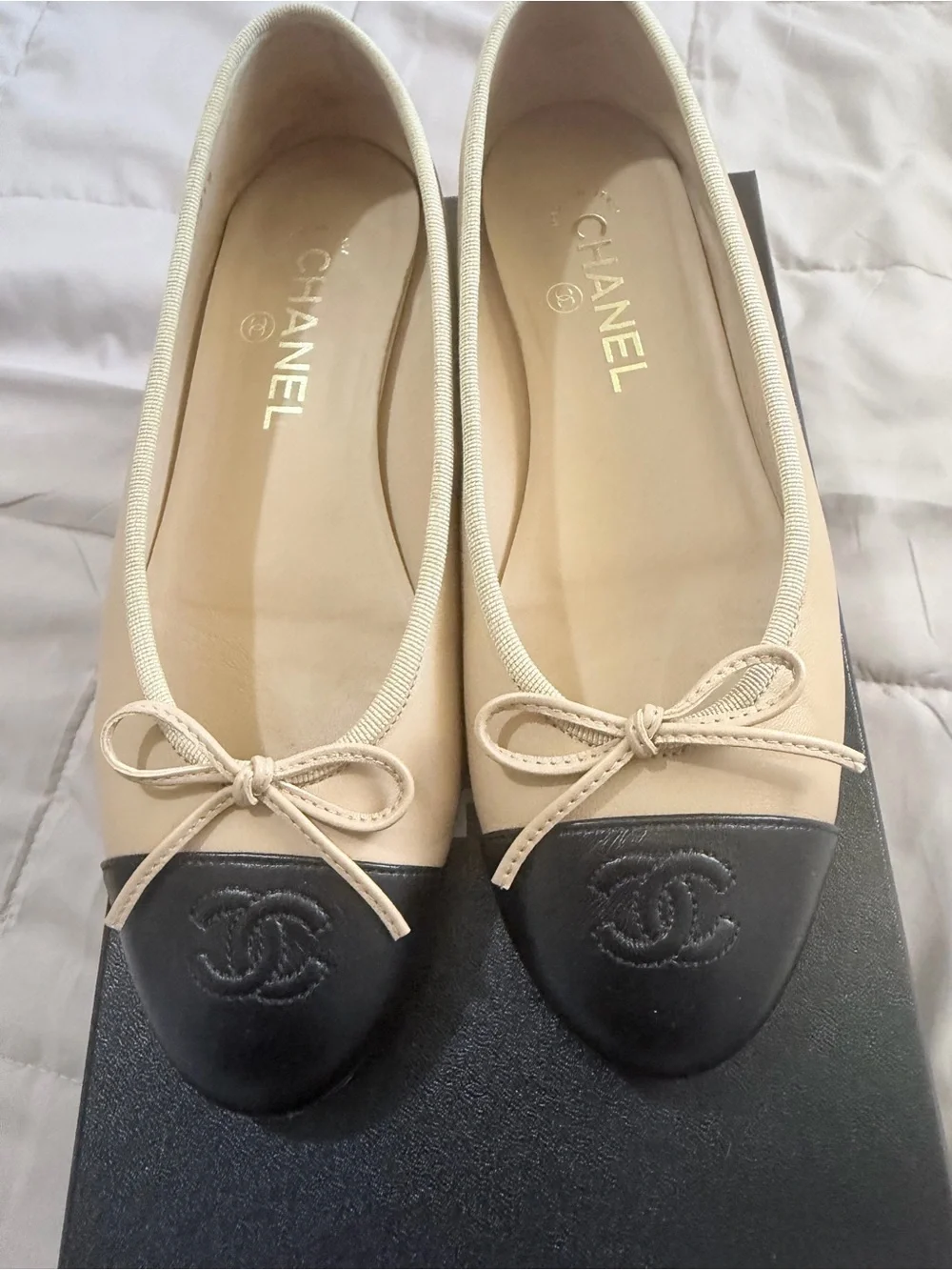 CHANEL Two-Tone Beige and Black Leather Cap-Toe Ballet Flats - Picture 2 of 5